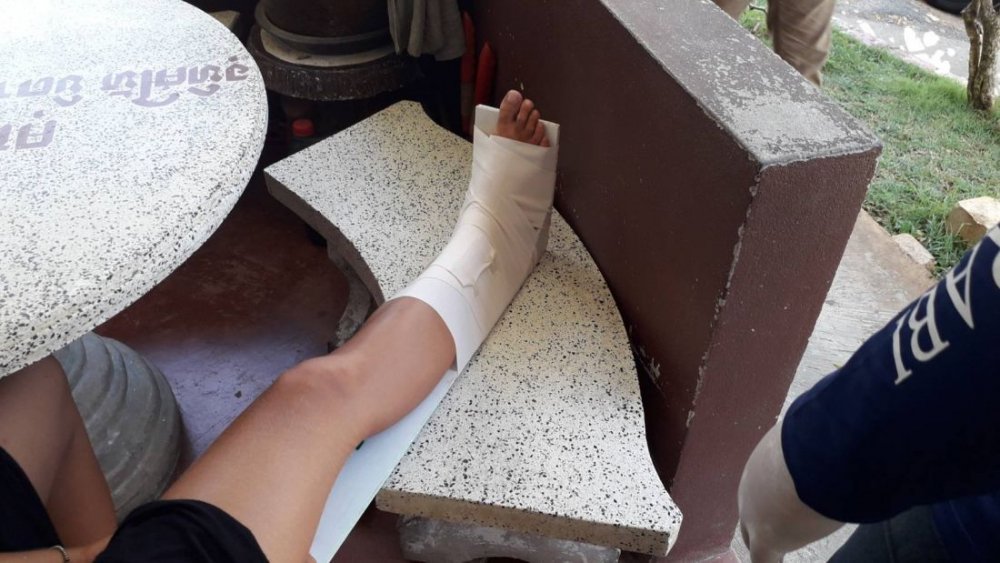 A female tourist was rushed to hospital on Monday after being bitten by a snake at the Tiger Cave Temple in Krabi. The 23-year-old German was taken to Krabi Hospital after she was been bitten on her right foot. She was conscious whilst being treated at the scene and during her trip to hospital. A friend of the German said that while they were walking inside the temple, her friend had stepped on a pile of leaves. She then screamed out as the snake bit her on the foot.